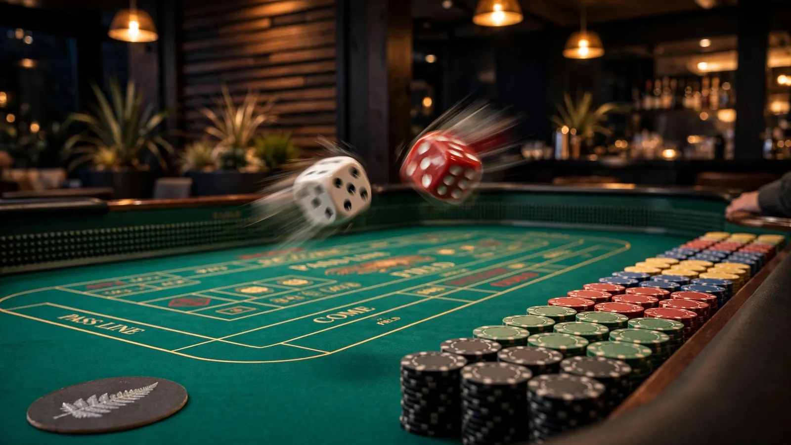 Dice rolling over a green craps table with stacked chips in a casino